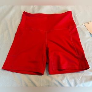 SOLD. Feed me fight me shorts, large, NWT!